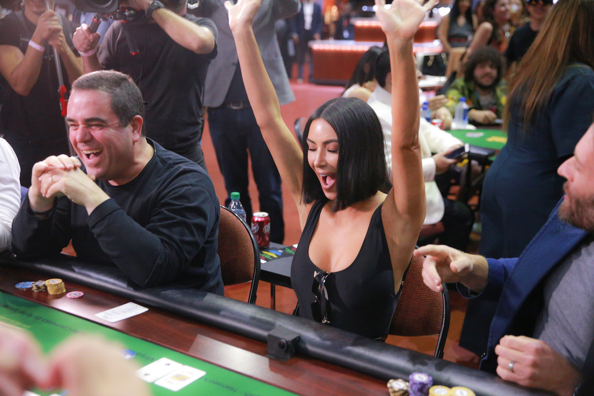 Kim Kardashian West celebrates after dragging a big pot in the City of Hope charity event! (Photo: GettyImages)