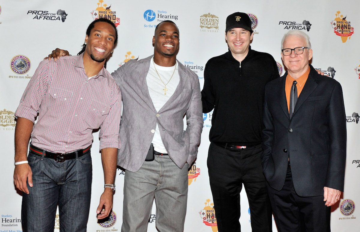 Phil Hellmuth and charity poker tournaments go way back! Here he's seen with Larry Fitzgerald, Adrian Peterson and Steve Martin at the 2011 'Raise Your Hand for Africa' at the Golden Nugget in Las Vegas. (Photo: GettyImages)