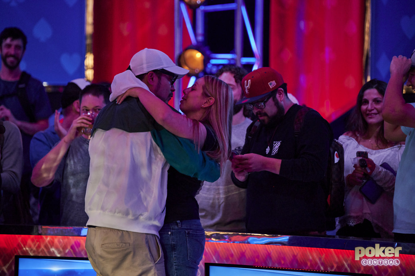 Phil Hui and his long-time girlfriend Loni Harwood share an intimate moment right after the final hand.