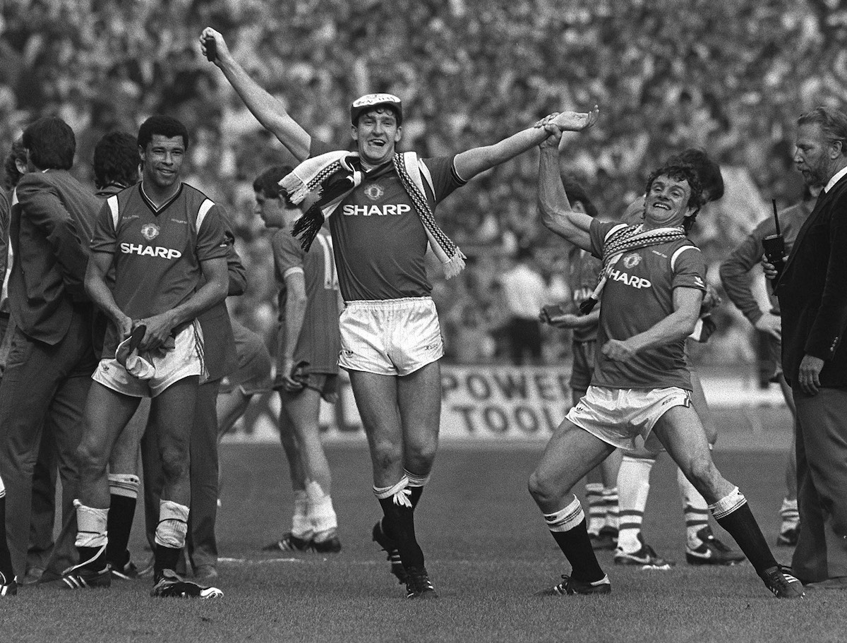 18/5/1985 FA Cup Final. Everton v Manchester United, Kevin Moran holds aloft the arm of United match-winner Norman Whiteside. (Photo by Mark Leech/Getty Images)