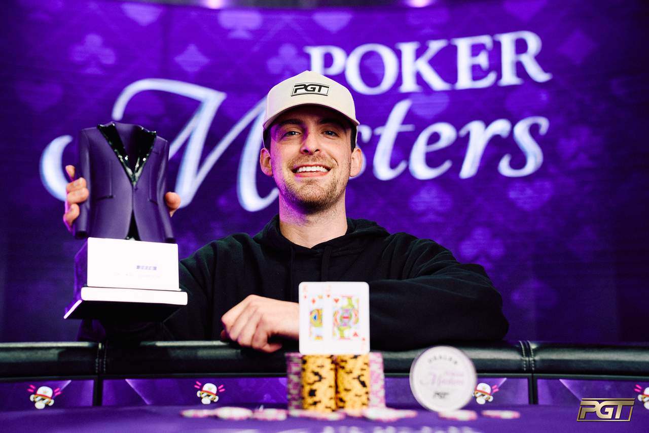 Nick Seward holding the purple Poker Masters trophy after winning Event #9 in Las Vegas